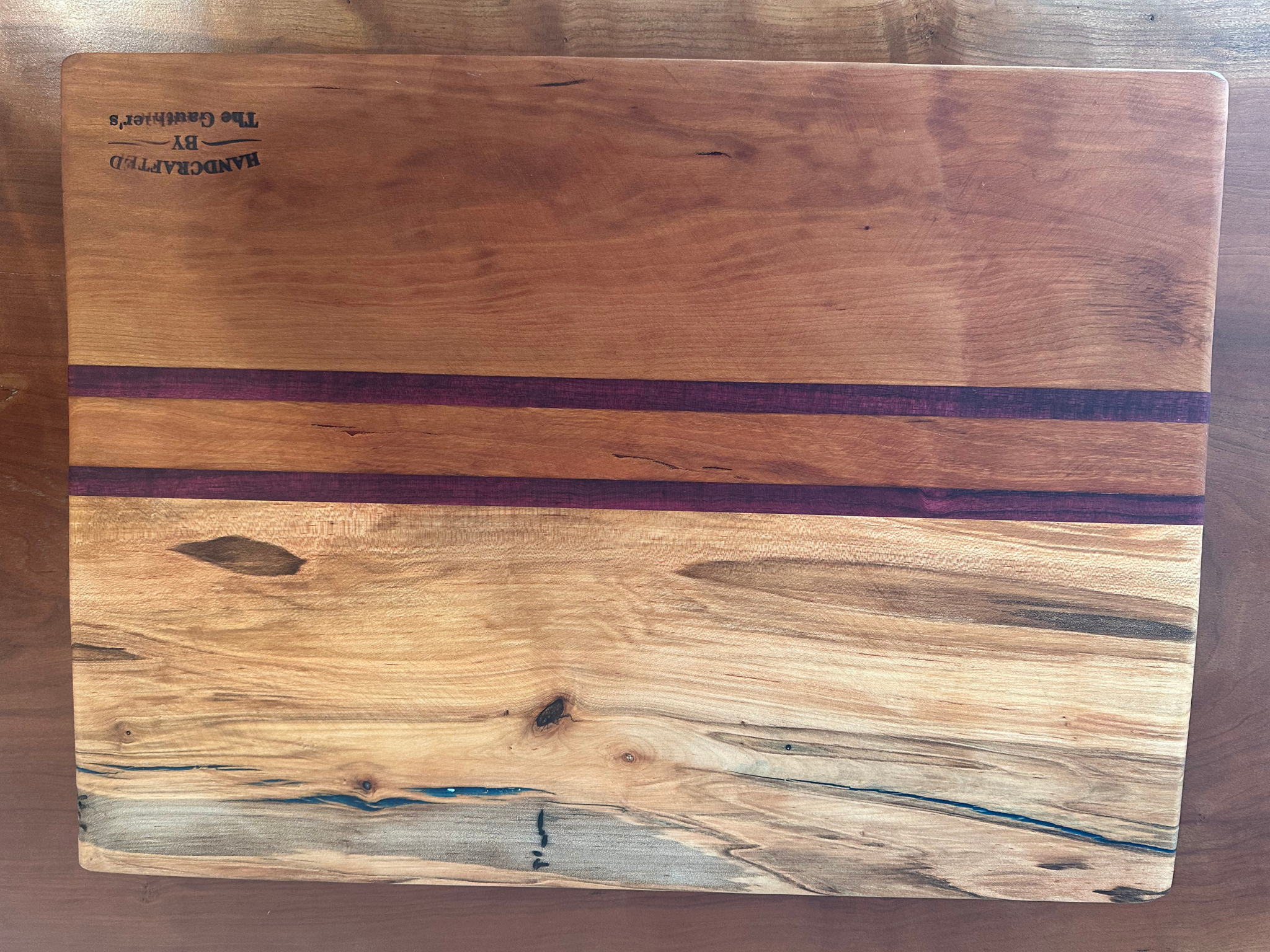 Cherry with Ambrosia with a Sandwich of Purpleheart Cutting Board