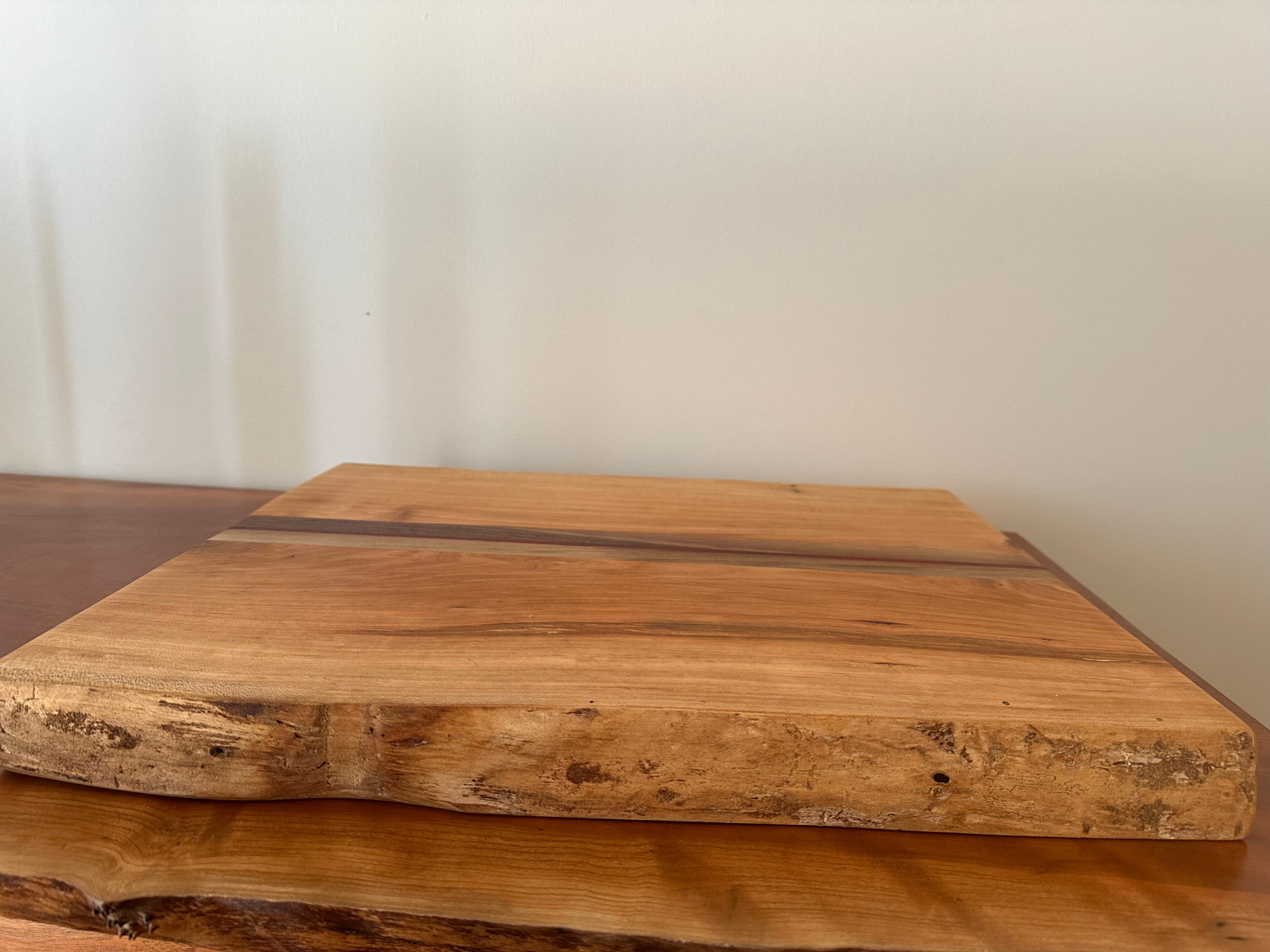 Double Cherry Live Edge with a Walnut Sandwich Cutting Board